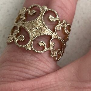 Intricate Gold Filigree Ring with Swirling Design